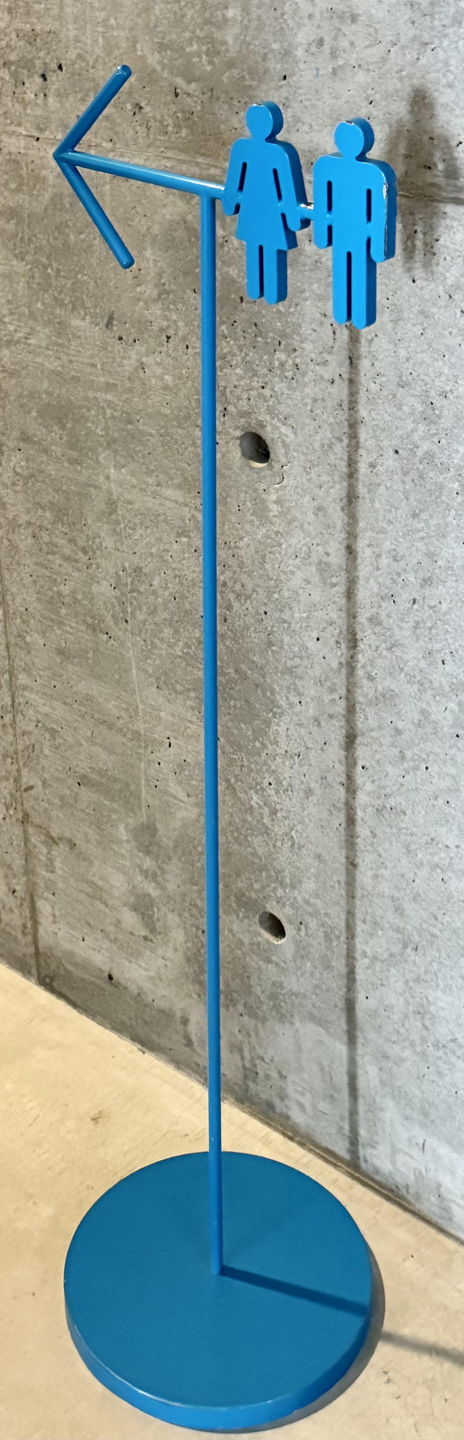 A toilet sign at 21_21 design sight